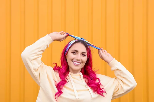 Beautiful Woman Bright Pink Hair Yellow Background — стоковое фото