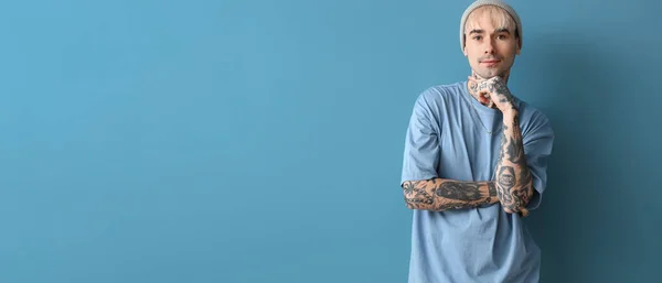 Young Cool Tattooed Man Blue Background Space Text — Stockfoto