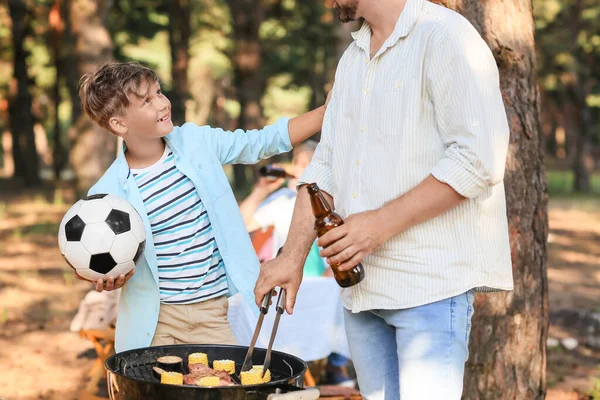 Little Boy Ball His Father Cooking Food Grill Barbecue Party — Stock Photo, Image