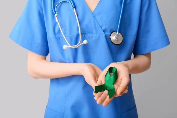 Female Doctor Green Ribbon Stethoscope Grey Background Closeup Liver Cancer — Stock Photo, Image