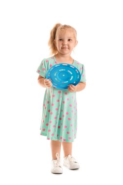 Cute little girl playing frisbee on white background