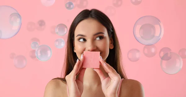 Beautiful Young Woman Soap Many Bubbles Pink Background — стоковое фото