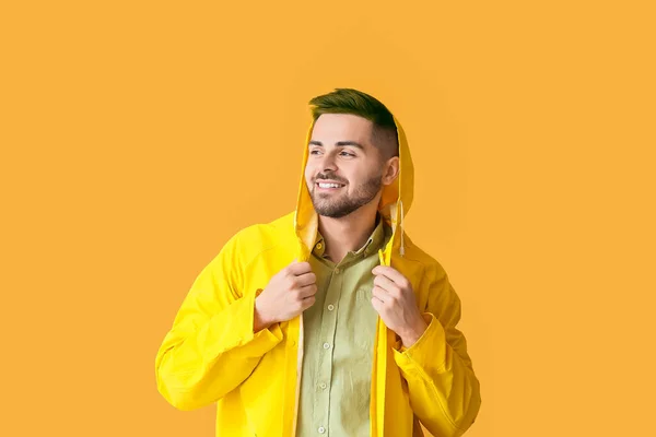 Stylish Young Man Unusual Hair Wearing Raincoat Orange Background — Zdjęcie stockowe