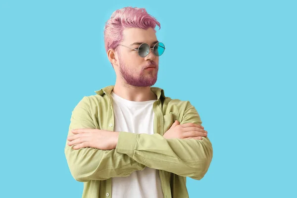 Stylish Young Man Unusual Pink Hair Beard Light Blue Background — Zdjęcie stockowe