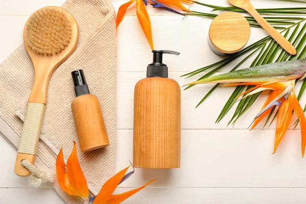 Composition Bottles Cosmetic Products Bath Supplies Strelitzia Flowers White Background — Stock Photo, Image