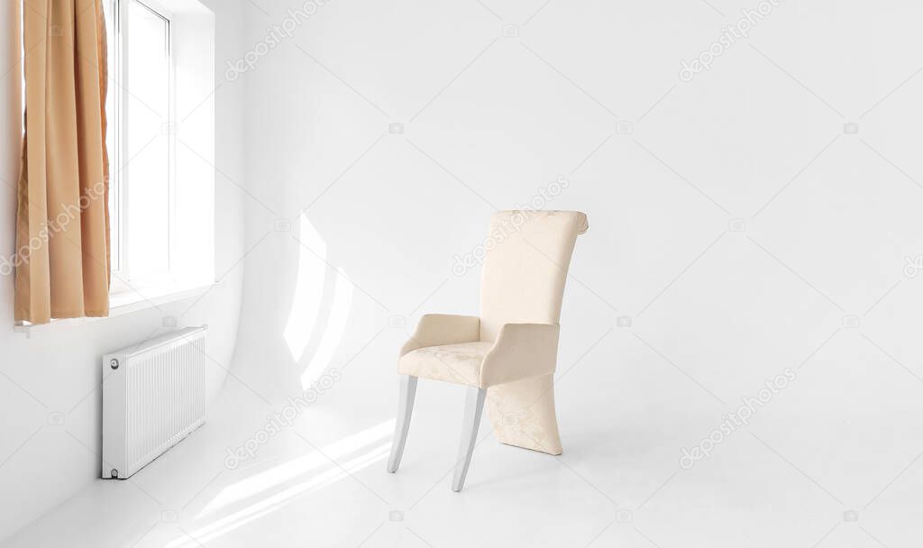 Stylish armchair in modern photo studio
