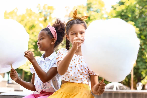 Cute Little Girls Cotton Candy Outdoors — Stockfoto