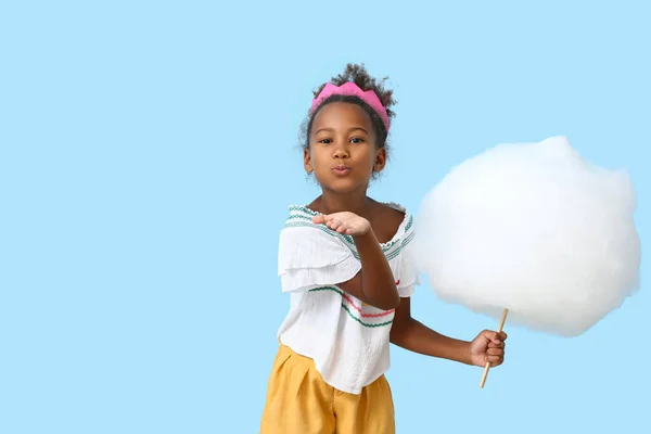 Little African American Girl Cotton Candy Blue Background — стоковое фото