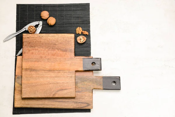 Wooden Cutting Boards Nutcracker Walnuts Light Background — ストック写真