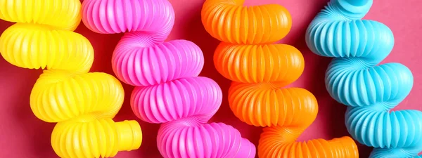 Pop Tubes Pink Background Banner Design — Stock Photo, Image