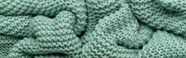 Texture of knitted fabric as background. Banner for design