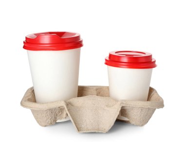 Holder with takeaway paper cups on white background