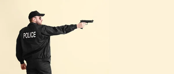 Male Police Officer Aiming Someone Light Background Space Text — 스톡 사진