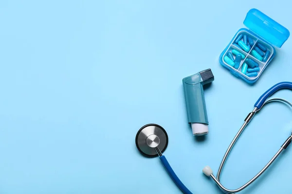 Asthma Inhaler Stethoscope Pills Blue Background — Stockfoto