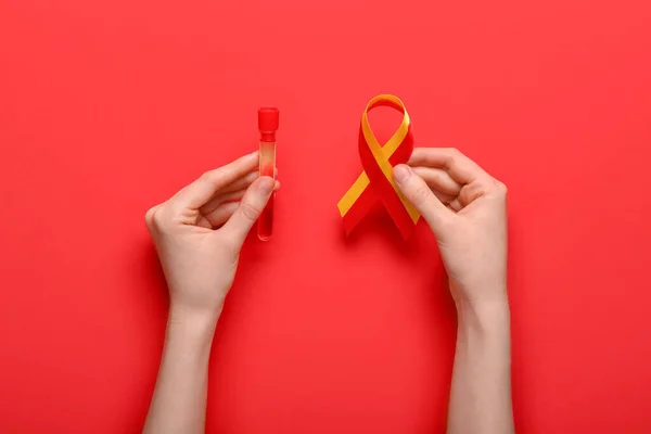 Woman Awareness Ribbon Blood Sample Red Background Hepatitis Concept — Zdjęcie stockowe
