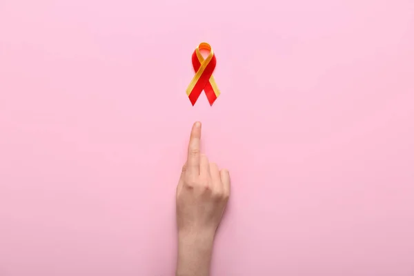 Woman Pointing Awareness Ribbon Pink Background Hepatitis Concept — Zdjęcie stockowe