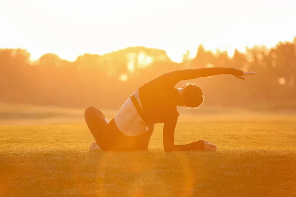 Beautiful Young Woman Practicing Yoga Outdoors Sunset — Foto de Stock