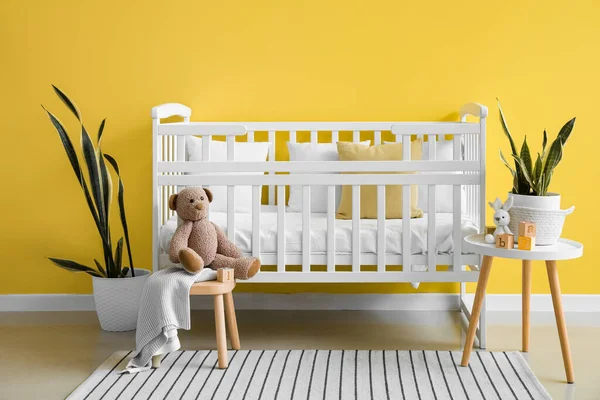 Interior Children Room Comfortable Crib Houseplants Yellow Wall —  Fotos de Stock