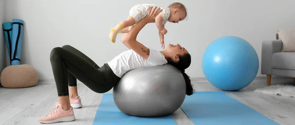 Sporty Young Woman Her Baby Doing Exercises Fitball Home — Fotografia de Stock