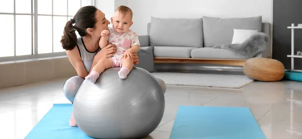 Sporty Young Mother Her Baby Doing Exercises Fitball Home — Fotografia de Stock