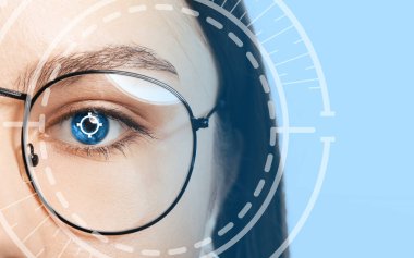 Young woman with iris scanning, closeup view