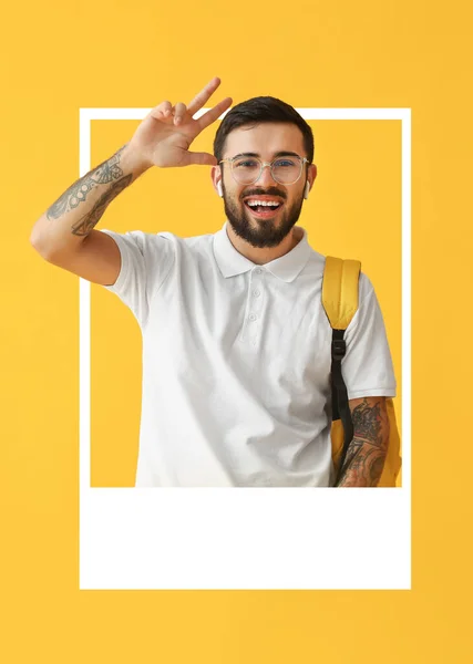 Handsome Tattooed Male Student Looking Out Frame Yellow Background — Stock Photo, Image
