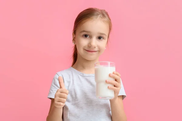 Cute Girl Holding Glass Milk Showing Thumb Color Background — Zdjęcie stockowe