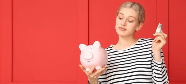 Pretty Young Woman Piggy Bank Money Red Background — Fotografia de Stock