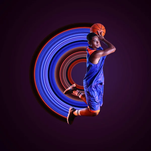 Poster Young Jumping African American Basketball Player Dark Background — Foto de Stock