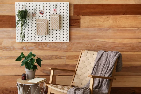 Armchair Pegboard Books Houseplant Wooden Wall Room Interior — Stok fotoğraf