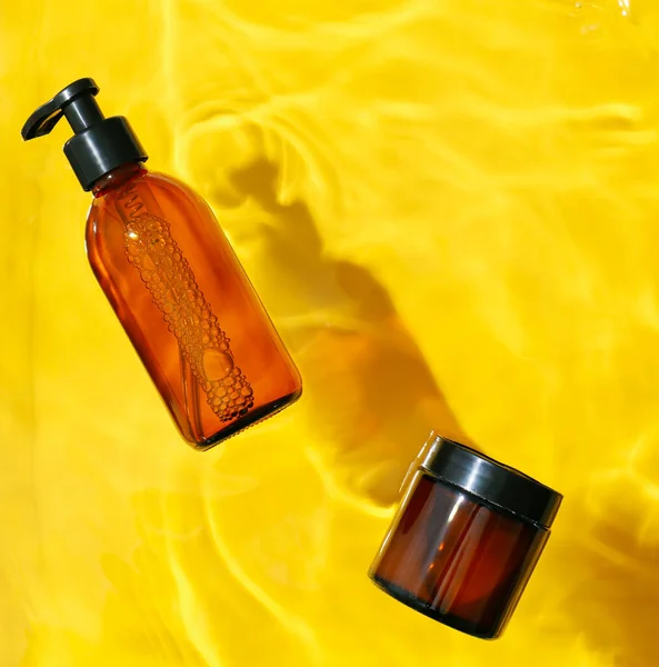 Bottle Jar Cosmetic Product Water Yellow Background — Stock Photo, Image