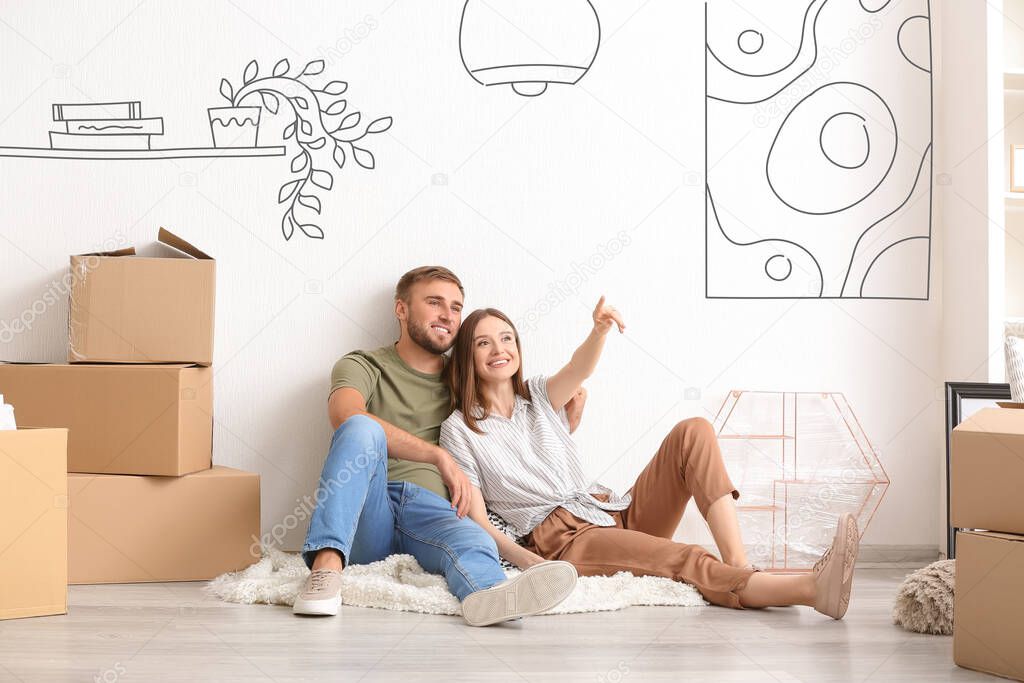 Happy couple planning design of their new home