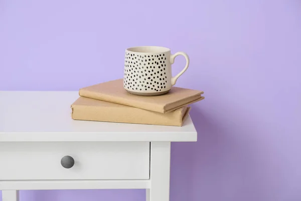Table Books Cup Violet Wall — Φωτογραφία Αρχείου