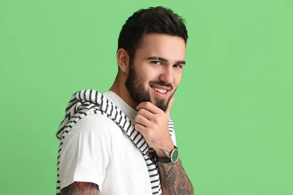 Fashionable Smiling Man Stylish Wristwatch Green Background — Zdjęcie stockowe