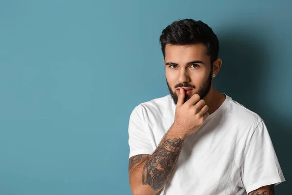 Young Bearded Man Touching Lips Blue Background —  Fotos de Stock