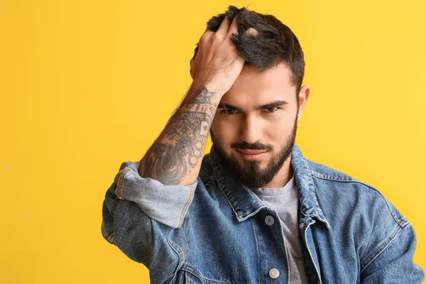 Bearded Man Touching Hair Yellow Background — стоковое фото