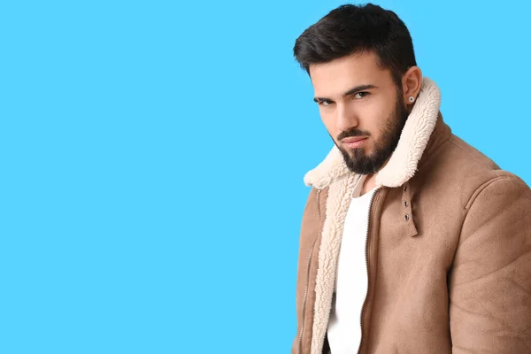 Fashionable Bearded Man Winter Jacket Blue Background — Stockfoto
