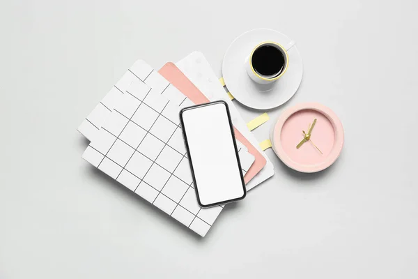 Composition Mobile Phone Cup Coffee Alarm Clock Notebooks Grey Background — Fotografia de Stock