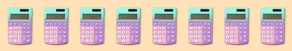 Muitas Calculadoras Modernas Fundo Bege — Fotografia de Stock