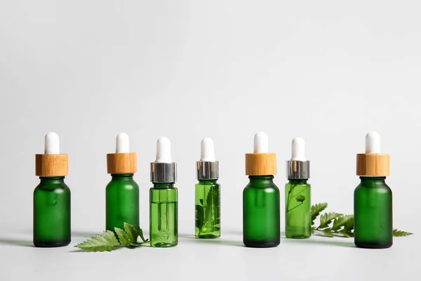 Different Bottles Natural Serum White Background — Stock Photo, Image