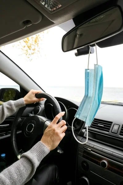 Medical Mask Hanging Rear View Mirror Car Female Driver — Stock Photo, Image