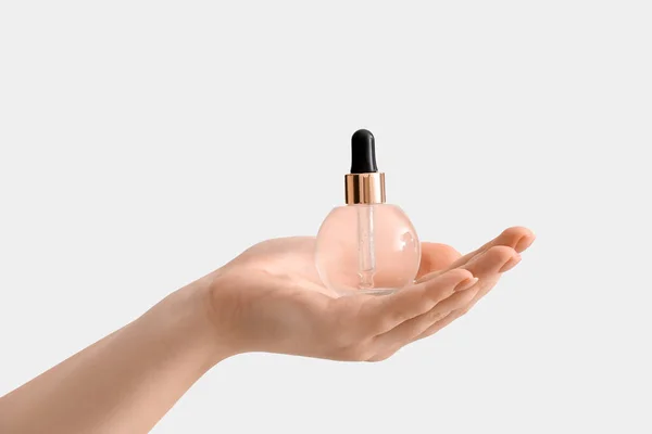 Female Hand Bottle Serum White Background Closeup — Stock Photo, Image