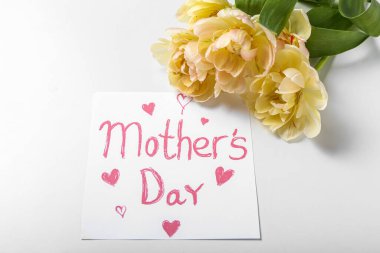 Card with text MOTHER'S DAY and yellow flowers on white background