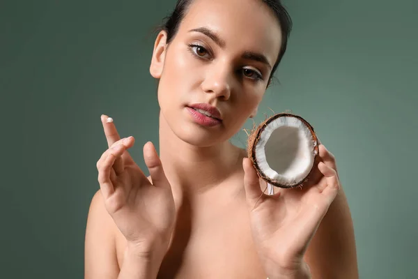 Young Woman Coconut Oil Green Background — Stock Photo, Image