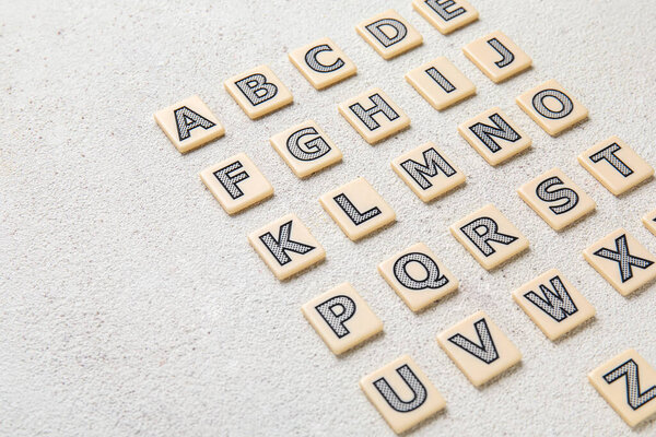 Different letters on white background. Alphabet concept