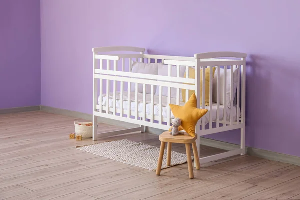 Baby Crib Stool Basket Toys Violet Wall — Stock Photo, Image