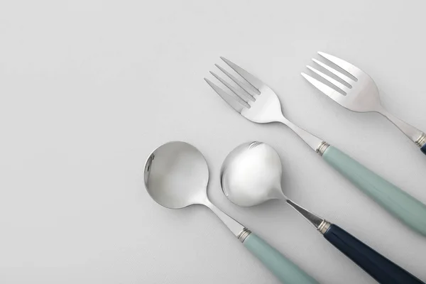 Different Stainless Steel Cutlery Light Background Closeup — Stock Photo, Image