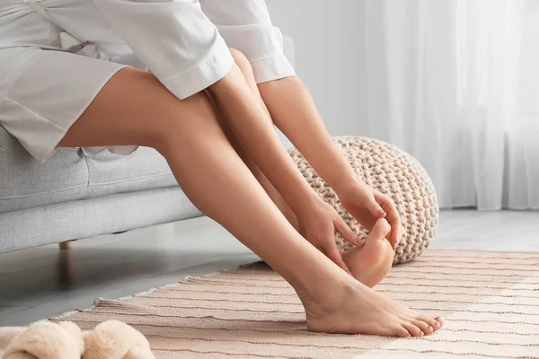 Woman Sitting Sofa Making Foot Massage Room Closeup — Stock Photo, Image