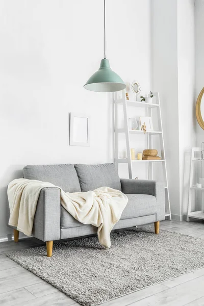 Grey Sofa Plaid Shelving Unit Light Living Room — Stock Photo, Image