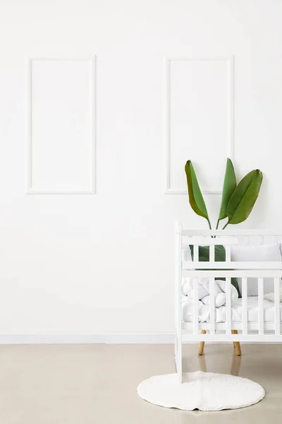 Baby Crib Pillows Palm Leaves Light Wall — Stock Photo, Image